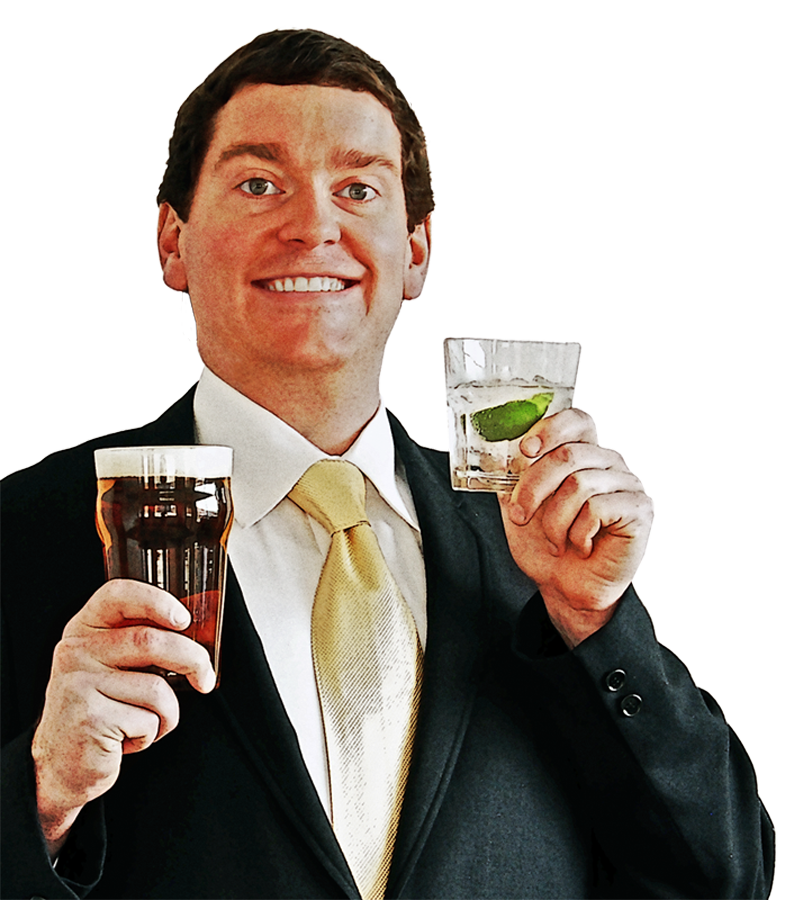 portrait of Fouhy holding two cocktails